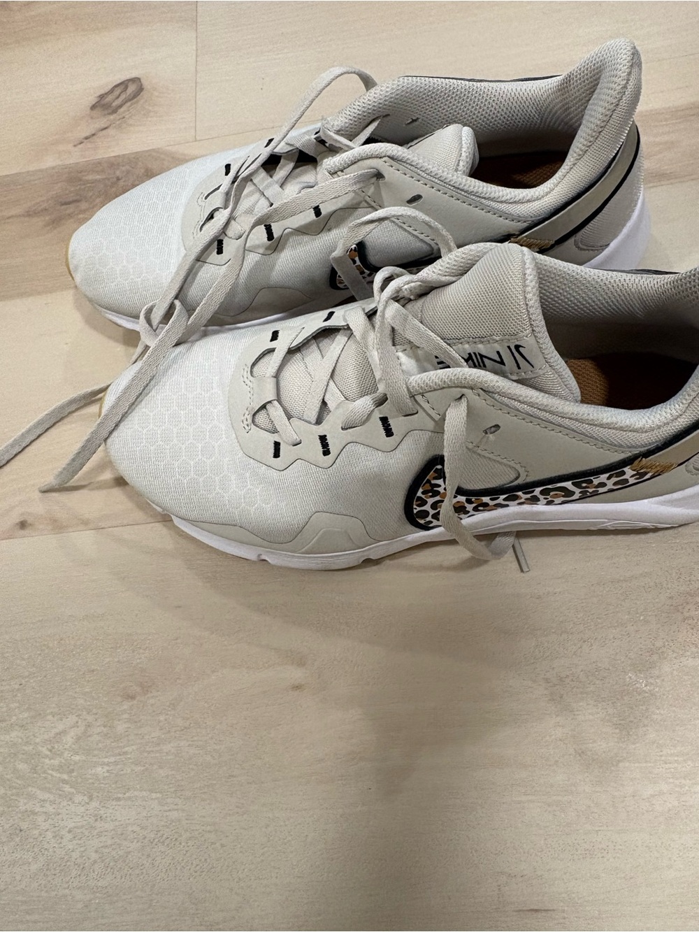 Nike Women’s Athletic Shoes White with Leopard Swoosh